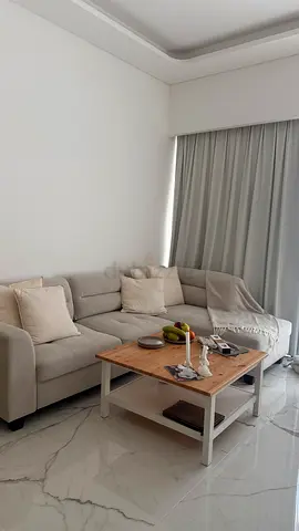 Light grey 5seater sofa with wooden coffee table good condition The listed price is for both the so