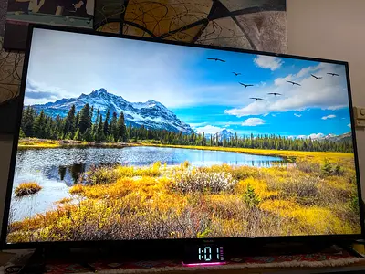 65-inch LED TV in good working condition with stand