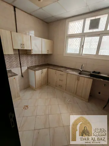 Spacious 1-Bedroom Apartment for Annual Rent in Al Bu Tina, Sharjah | Very Large Living Space, Central A/C and Dirt Parking