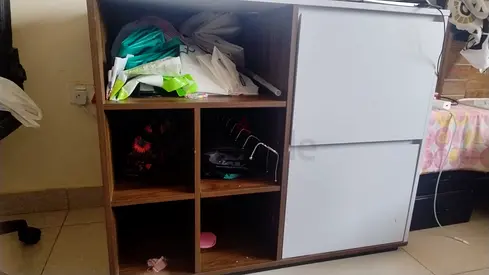 Compact wooden storage unit with white doors — 6 cubby shelves