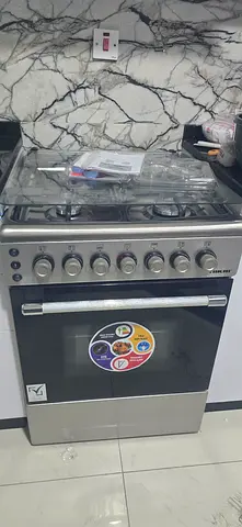 NEW Stainless Steel 4-Burner Gas Stove with Oven - Good Working Condition