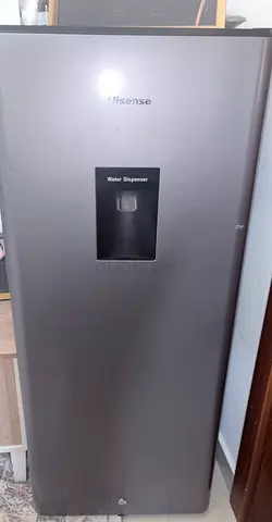 Hisense single-door refrigerator with water dispenser - good condition