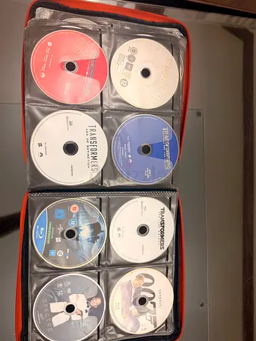 Mixed Blu-ray/DVD movie collection including Marvel,Transformers, Spectre, Skyfall, Warnerbrothers