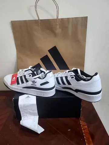 Adidas Forum Low / Forum Low CL in the White / Black colorway.