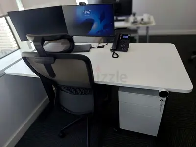 We have a modern office desk for sale, used for nine months (measuring 160 x 80 cm). It features a w