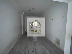 A 1-bedroom apartment with a living room is available for annual rent in Emirates City, Ajman. The a
