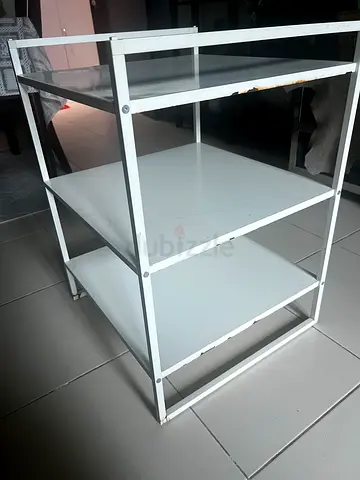 White metal 3-tier shelving unit — compact storage rack
