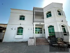 Commercial villa for annual rent in Al Rawda 1, Ajman. 8 rooms, living room, majlis, large courtyard