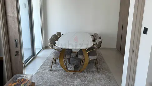 Marble-top dining table with 6 upholstered chairs and rug - modern set