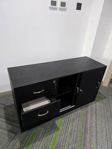 Black lockable office cabinet with drawers and storage