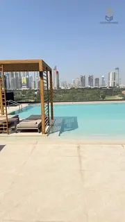 Golf Heights 1BR | Downtown & Park Views | Pool Access