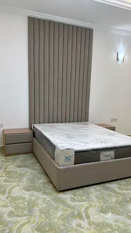 Queen upholstered bed frame with headboard panel and 2 bedside drawers