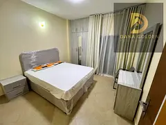 One-bedroom apartment with a living room for rent in Al Qasimia.