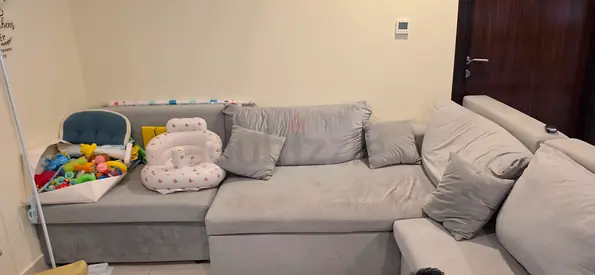 Light grey L-shaped corner sofa, perfect condition
