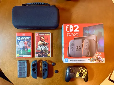 Nintendo Switch 2 (with Box)+ RDR + FC26 + Travel Case + MH Switch Pro Controller - Like New