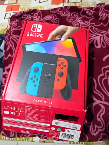 Nintendo Switch OLED Model + Super Smash Bros game