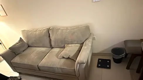 Light grey 2-seater sofa in good condition and two chairs