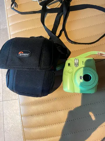 Fujifilm Instax Mini instant camera with Lowepro carrying case (green)