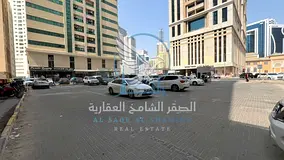 A fully ready parking lot is available for rent in Al Majaz 2, Sharjah, with a total area of 10,000 