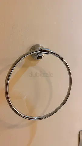 Chrome towel ring (wall-mounted) in good condition