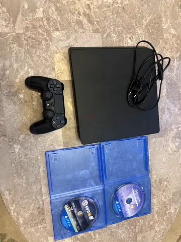 Ps4 500GB with a controller + 2 games and controller charger