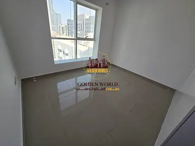 For Annual Rent in Al Majaz 2, a 1-bedroom apartment with a living room, Unit 1206. Master bedroom,