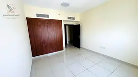 Ajman, Khalifa Street: One bedroom and living room for annual rent, with gym and balcony. Excellent 