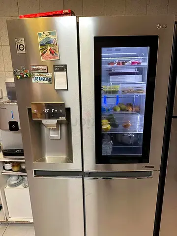 LG Side-by-Side Refrigerator with InstaView Door and Water Dispenser - Silver like new