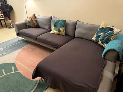 L-shaped sectional sofa in grey with chaise - good condition