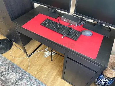 Compact black computer desk with drawers — good condition