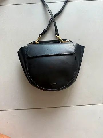 WANDLER  Black leather crossbody saddle bag