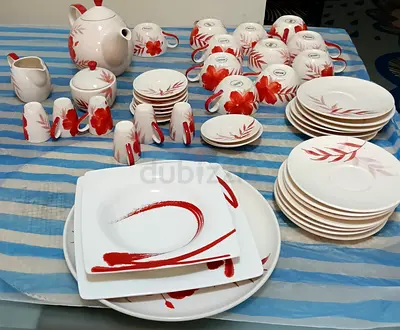 A beautiful and elegant tea and coffee including matching plates for serving cakes and sweets.