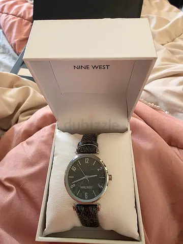 Nine West women's analog wristwatch with leather strap - good condition