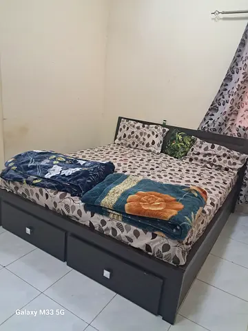 Double bed with under-bed drawers - good condition