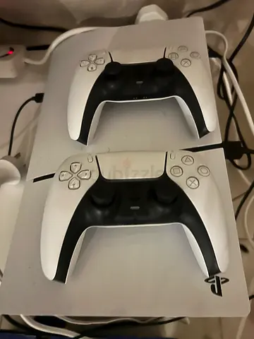 PlayStation 5 Slim Digital Edition 1t + 2 DualSense Controllers (Like New with Box) Description: