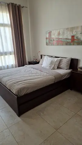 King size wooden bed frame with storage and matching bedside tables