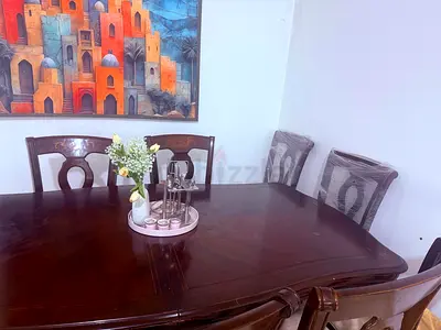 Want an original elegant and classic wood Dining table for your family? I am selling it