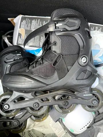 Used black inline rollerblades - size 40