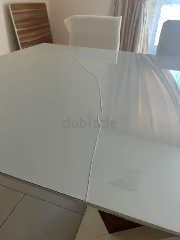 White glass dining table (6 seater) with visible crack — needs to change the glass on top