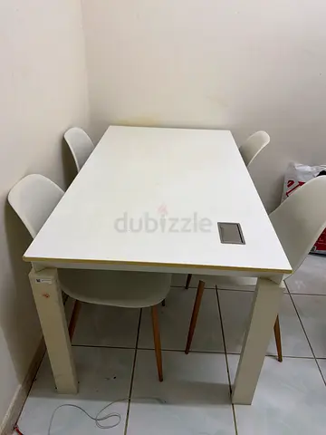 White dining table with 4 matching chairs - modern, good condition