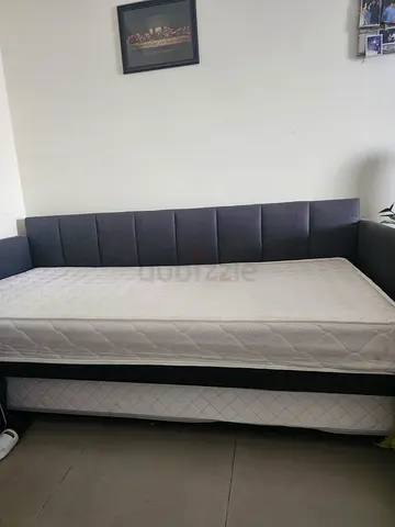 Grey fabric daybed with mattress - good condition