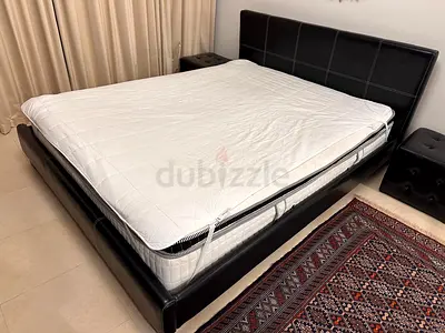 Elegant leather Black bed for sale including medical mattress and besides leathers tables