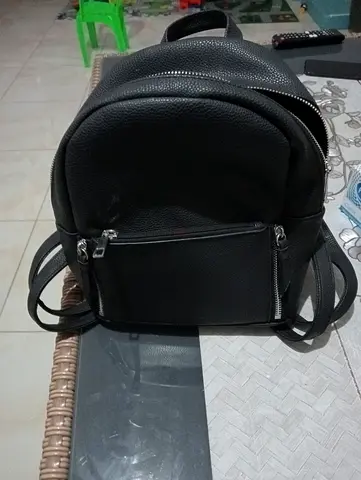 Black leather small backpack with front pockets - good condition