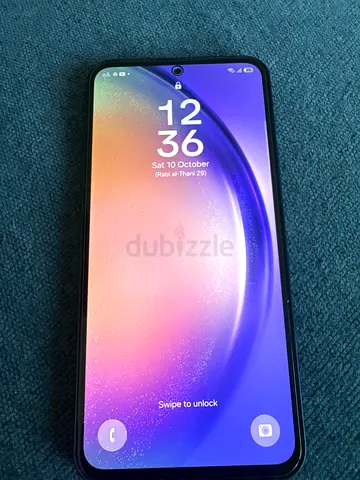Samsung Galaxy A 54 5G phone with triple rear cameras - good condition