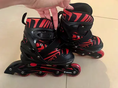 Red & Black Adjustable Inline Skates - Size Adjustable, Good Condition