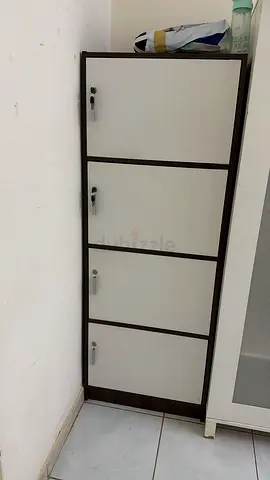 Low cabinet with four doors - dark frame, white panels