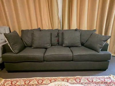 Dark grey 5-seater sofa with cushions - good condition
