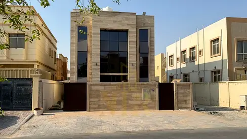**Distinctive Villa for Sale in Al Muwaihat 2 – Ajman | Corner Plot (Street & Side-street Access) | Two Floors + Roof | 5 Bedrooms | 4,500 sq. ft.** P