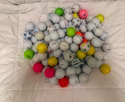 100 assorted golf balls