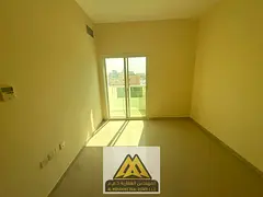 1BR in Al Hamidiya 1, central AC and balcony, AED 28,005 yearly, payable in 4 or 6 payments.